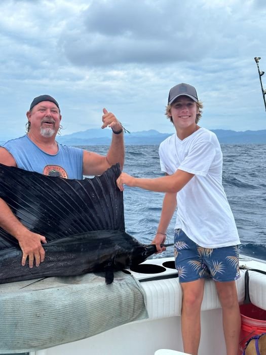 Sailfish on the covering board before going back in the water