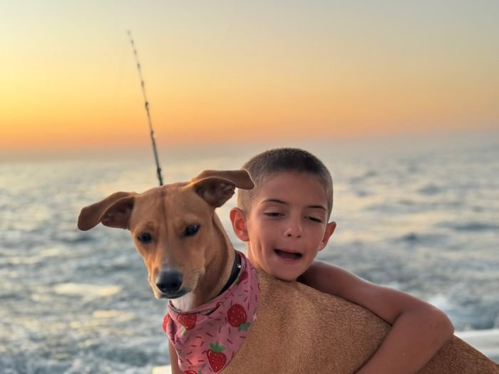Sunset run home with the boat dog